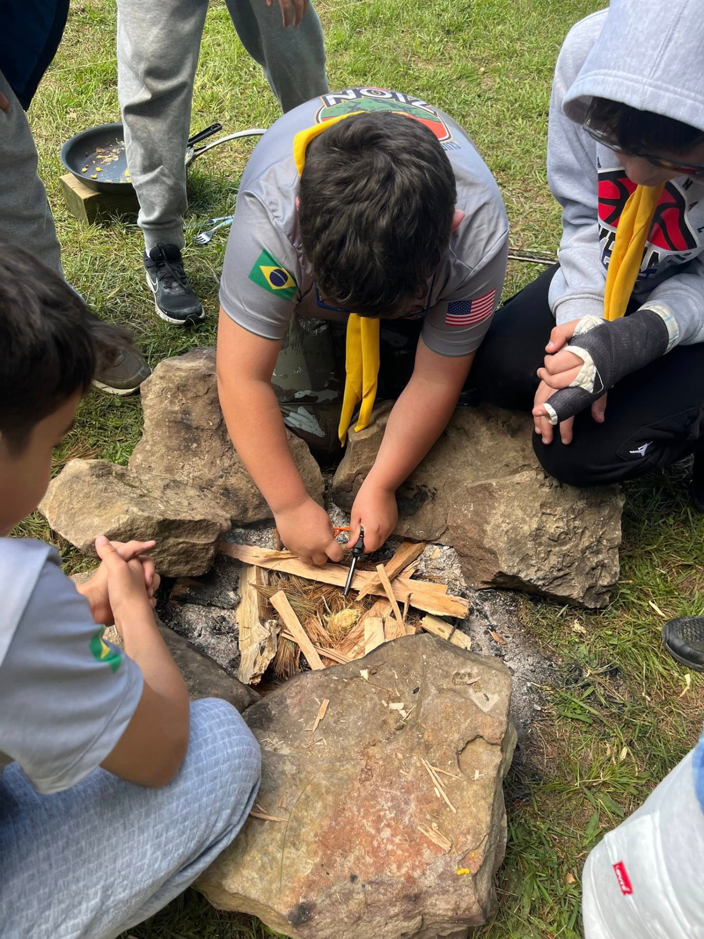 Pathfinders learning fire building skills